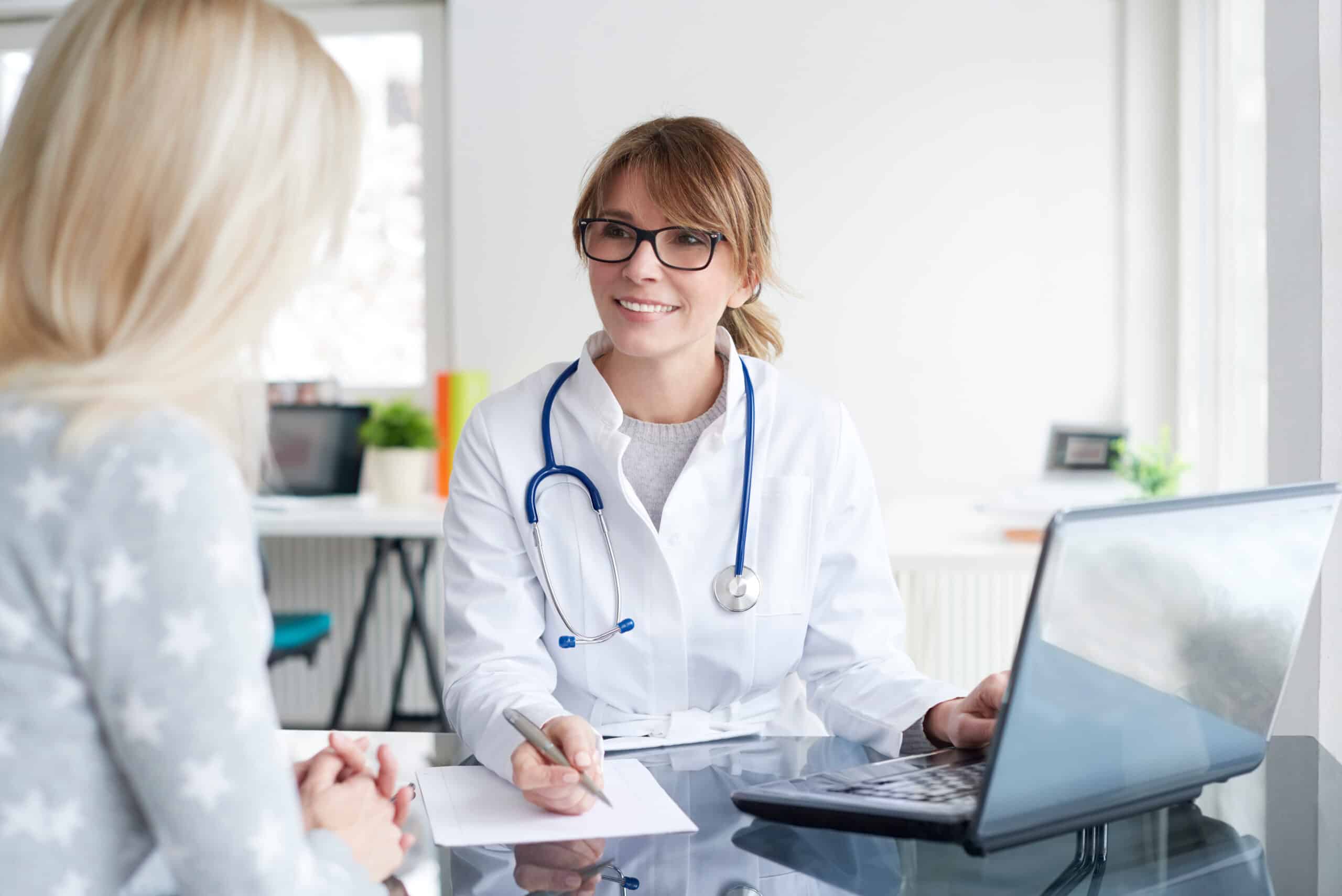 Doctor talking with patient