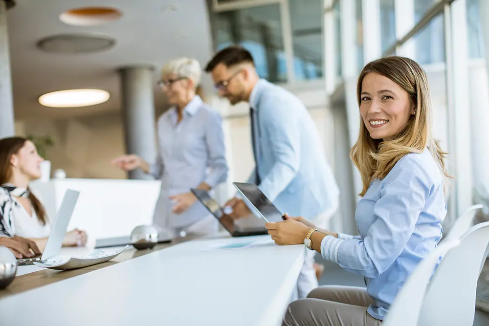 Young woman with group of business people have a meeting and working