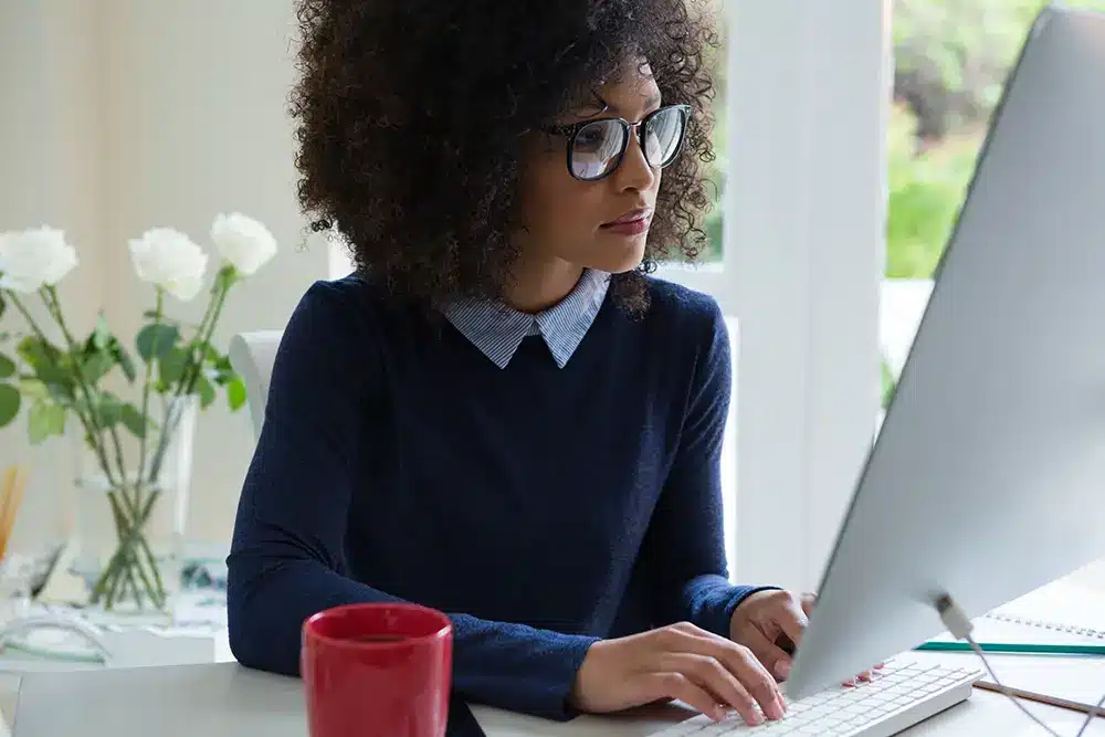 woman at desktop computer