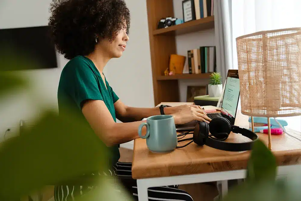 Woman searches computer for growth opportunities