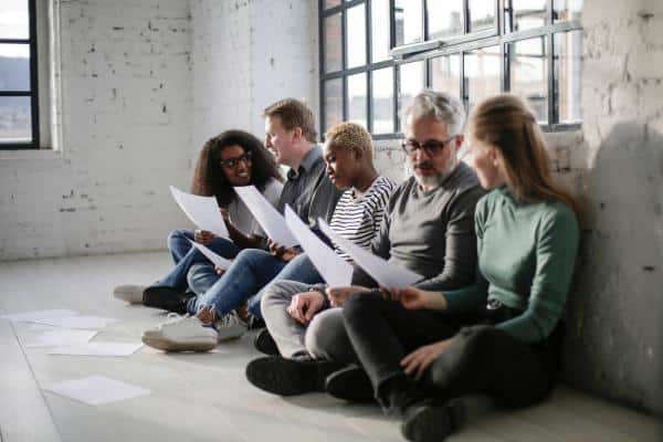 people sitting on floor