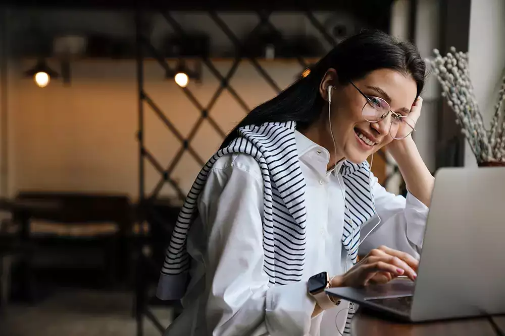 Woman sits at computer taking survey