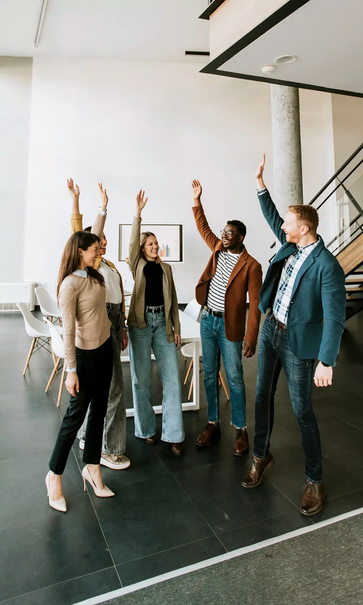 Group of coworkers cheering