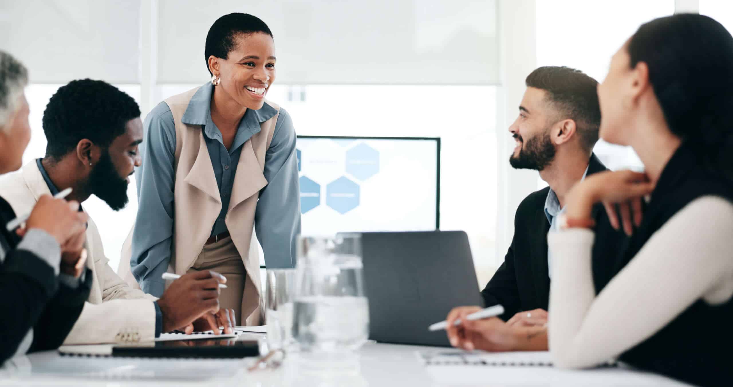 employees engaging in collaboration in a business meeting