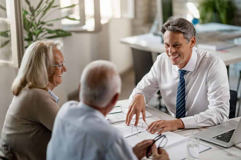 coworkers discussing 360 degree feedback results