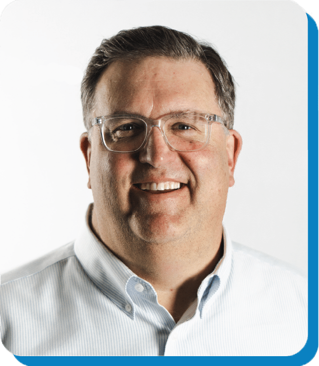 Portrait of Matt Wride, CEO of TMA Performance, on top of a blue rounded rectangle