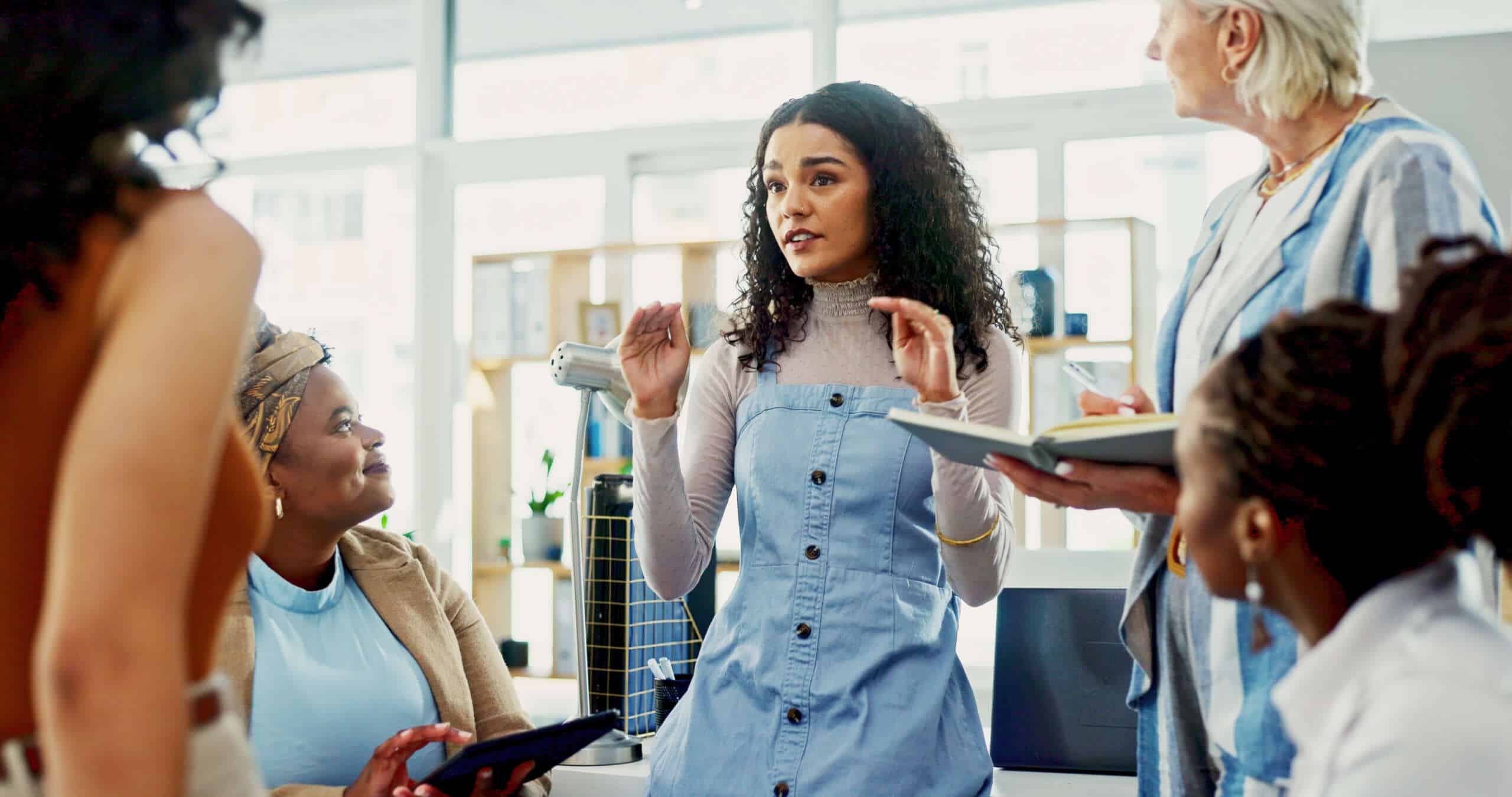 Collaboration, planning and project management with business women in office for discussion. Creative, design and explain with employee group in workplace for assignment, delegation or tasks